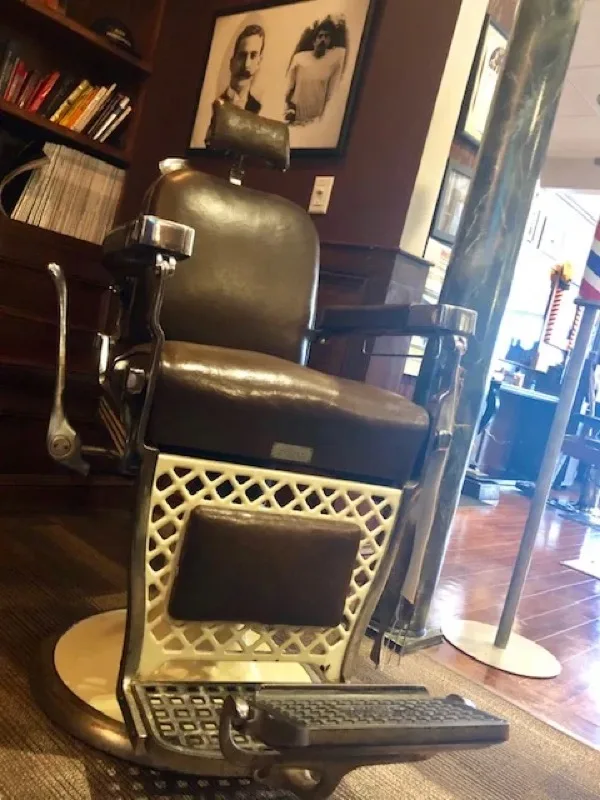 Antique barber chair on display