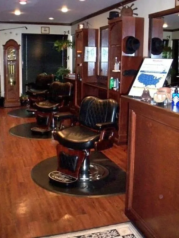 Row of barber chairs in the shop
