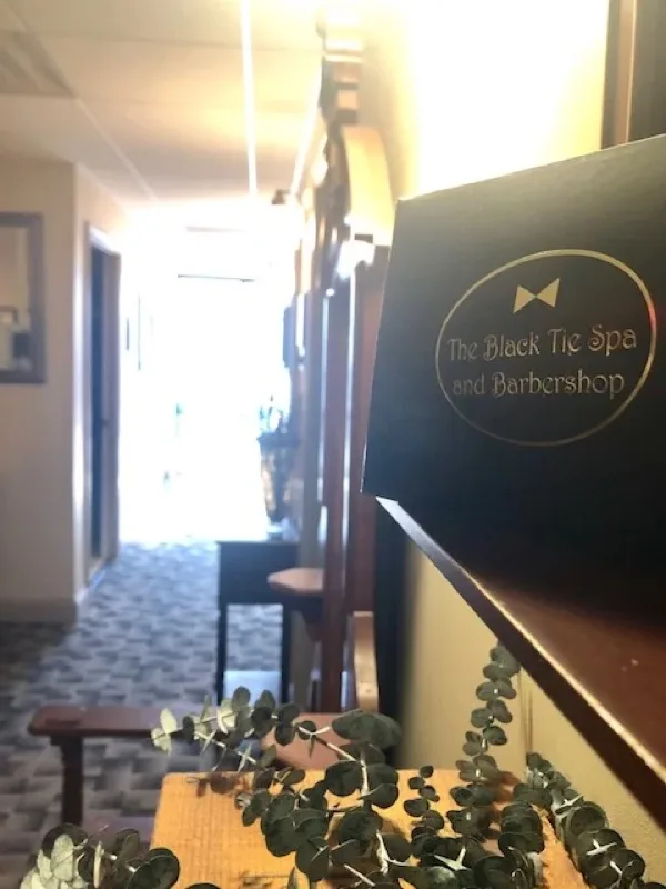 The Black Tie Spa and Barbershop entrance signage